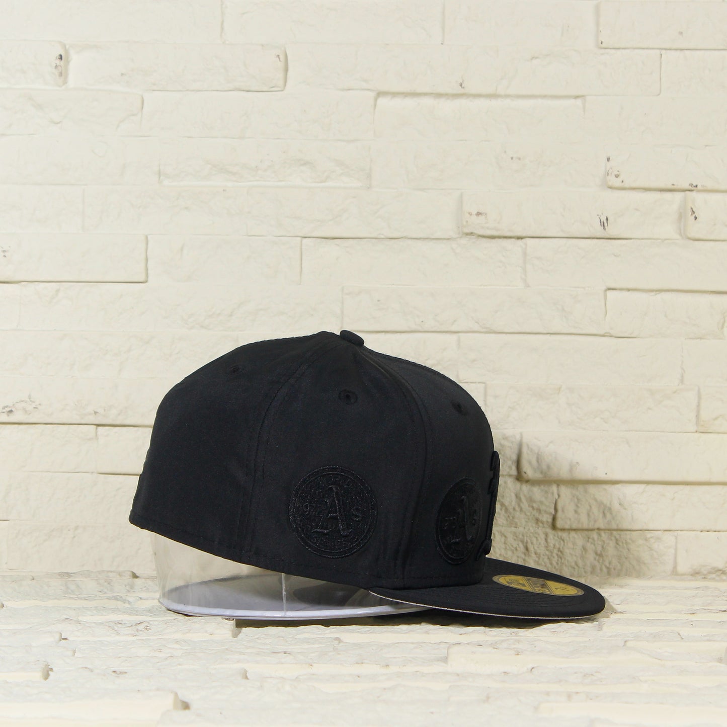 Oakland Athletic's 'Triple Black Multi Logo' 59FIFTY Fitted