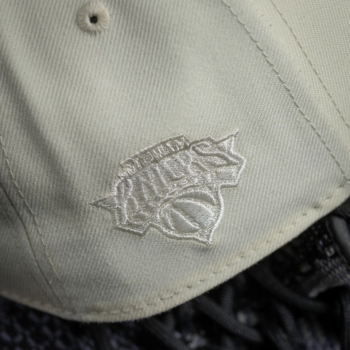 FAM Exclusive — New York Knicks Chrome White Black 9FORTY A-Frame Snapback